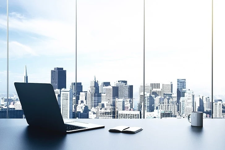 A bright workspace overlooking an international city